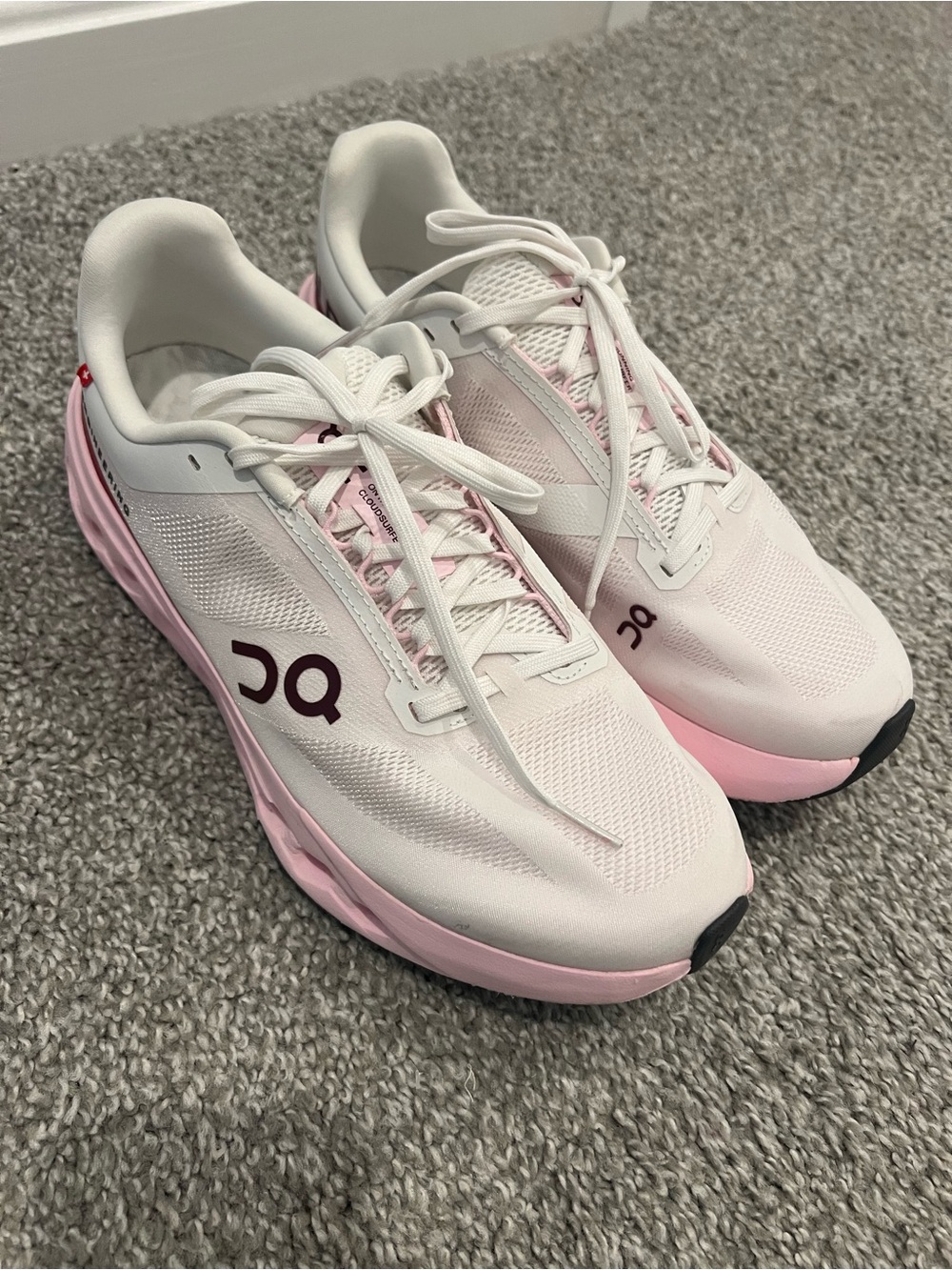 On Running Cloud Surfer Next Women's Sneakers in White & Light Pink